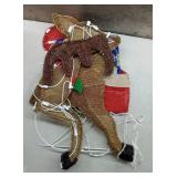 HOLIDAY STYLE LIGHTED REINDEER WITH SLEIGH WITH 50 CLEAR MINIATURE LIGHTS RUST RESISTANT COATED WIRE 24 INCH H/23 INCH W(POWER ON!)