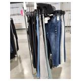 Half Moon Clothing Display And Lot Of Jeans