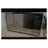 $$! Oster 1.3 Cu. ft. Stainless Steel With Mirror Finish Microwave Oven 1000 Watt