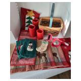 3 red LED candles, solar spotlight, small quilted Christmas stocking, fingertip towels. placemats, basket