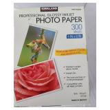 Photo paper, can of electronics duster, easel, magazine holder