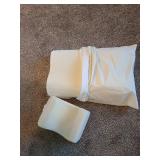 Memory foam standard size contour pillow in zippered case and a small neck contour pillow.