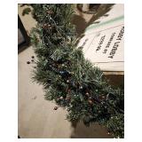 Large Christmas wreath with multicolored ornaments