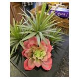 Faux succulent plant in pot