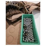 Box of ball bearings, ammo belt, ammo vest, pretty worn