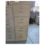 Metal four drawer legal size file cabinet