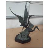 bronze bird statue