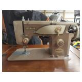 Alco sewing machine in cabinet