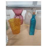 assorted bottles and vases