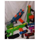 8 Nerf guns and darts