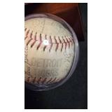 Detroit tigers autographed baseball in display case