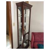 Tall curio cabinet with light