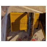 2- Black and yellow rough surface scrub brushes