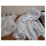 Mesh washing bags and a basket