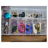 More than 10 pairs of earring in a small organizer