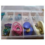 More than 10 pairs of earring in a small organizer