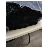 black shaggy rug