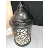 VP Home Decorative Flickering Flameless LED Candle Lantern with Remote & Ring to Hang, Black, 11" H x 5.25"D. Our black lanterns decorative requires 3 AAA batteries (Not Included)