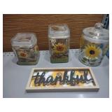 sunflower containers and sign