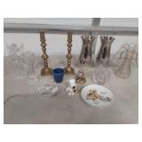 Brass candlesticks and glassware decor