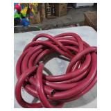 bundle of red air hose