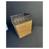 wicker and black iron waste basket