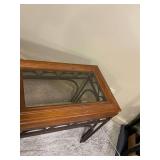 Iron and wood glass top sofa table 26 x 52 x 18 in (located in basement)