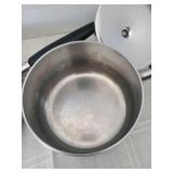 Aluminum Wear-Ever skillet and pot with lids.