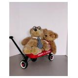 Stuffed bears inside miniature Radio Flyer Wagon