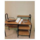 Desk with clamp paper or book holder. Desk needs some TLC . 43 x 48 x 23 Located in the basement