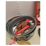 Pampered Chef cookie mold and pie gate, cake pan, cornbread pan, and mini cupcake pan