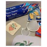 Wax paper, cutting sheets, funnels and hot plates