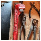 Pipe wrench, pliers and adjustable wrench