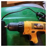 Dewalt drill with battery charger and assorted drill bits