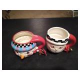 (2) Christmas mugs.