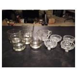 (5) drinking glasses and (4) vintage 3 footed sea shell.