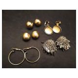 (5) Pairs of clip on earrings.