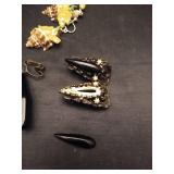 (1) Pair of sea shell clip on earrings and (2) Pairs of black gem clip on earrings.