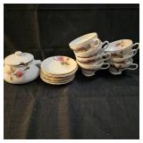 Set of 7 vintage tea saucers and cups with sugar jar