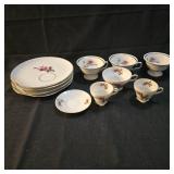 Set of four plates with one saucer, two small tea cups and four large tea cups mismatched set