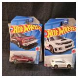 Lot of 4 Hot Wheels in packages