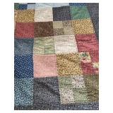 Machine quilted multi-colored quilt