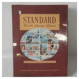 Standard World Stamp Album W/ Some Stamps