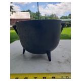 Small cast iron bean pot with small hole