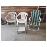 Three lawn chairs and folding plastic foot stool