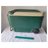 Green and Tan Igloo Cooler on Wheels