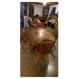 Oval Dining room table warped, 4 chairs , 2