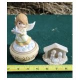 Precious Moments figurines and music box