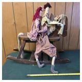 Wooden rocking horse with primitive dolls