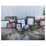 Several framed pictures and window mirror